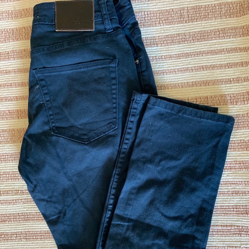 Men’s navy blue dress pants.